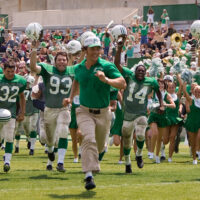 football movies to watch on hbo max: we are marshall players and coach running onto field