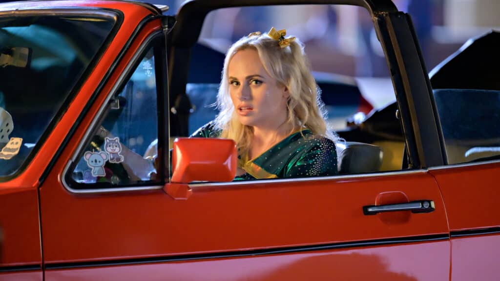 Is Senior Year on Netflix safe for teens and tweens to watch? Parents guide. Rebel Wilson in a red convertable car. 