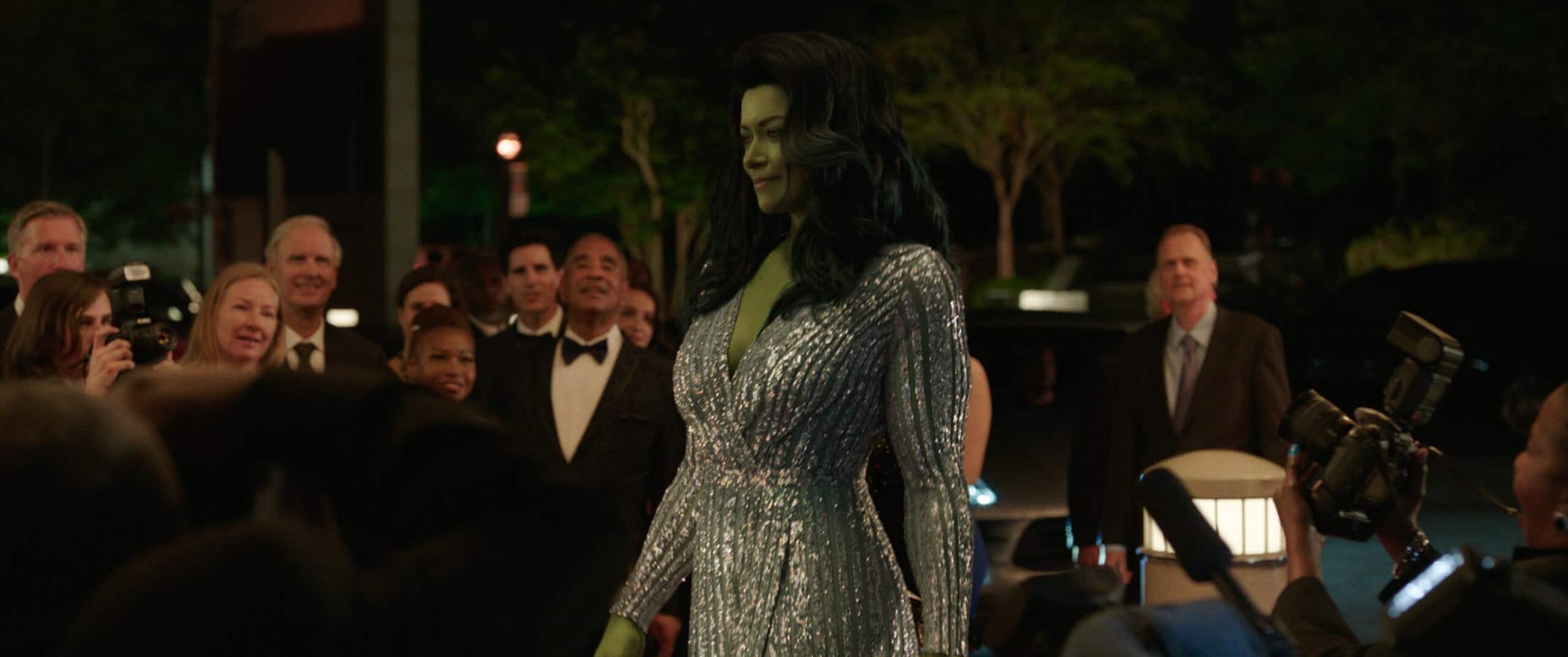 why is she hulk rated tv 14? parents guide and age rating. Green tall woman in a sparkly evening dress walking. 