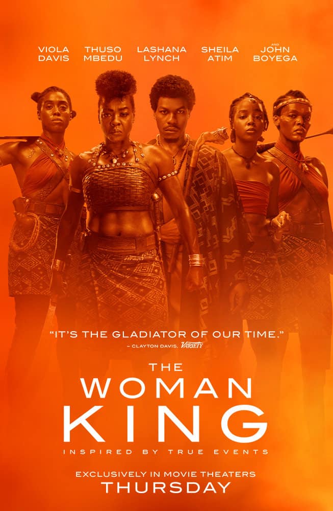 what is the age rating for the woman king? parents guide. 5 warriors standing together with an orange background.