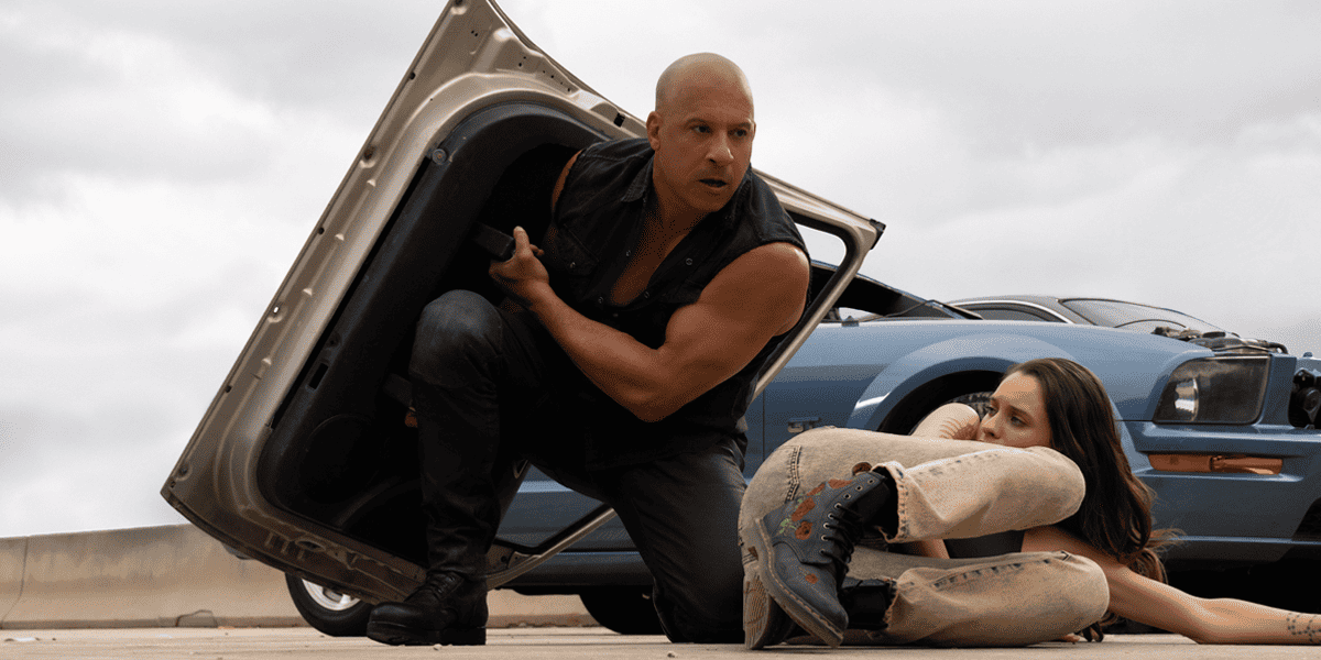 dom toretto holding a card door as a shield for a girl. age rating of fast x parents guide